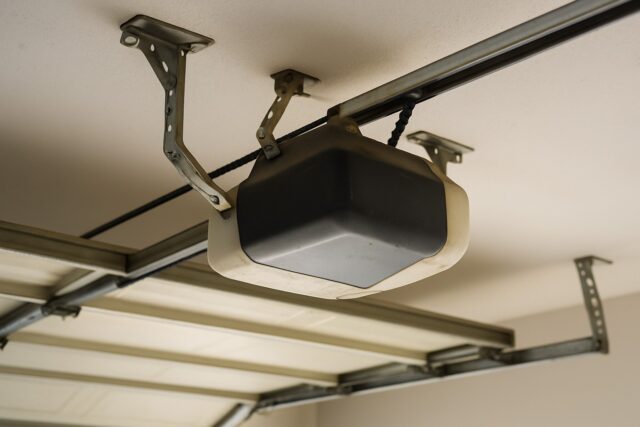 Overhead opener inspected during a Garage door tune-up to ensure proper alignment and smooth door operation.